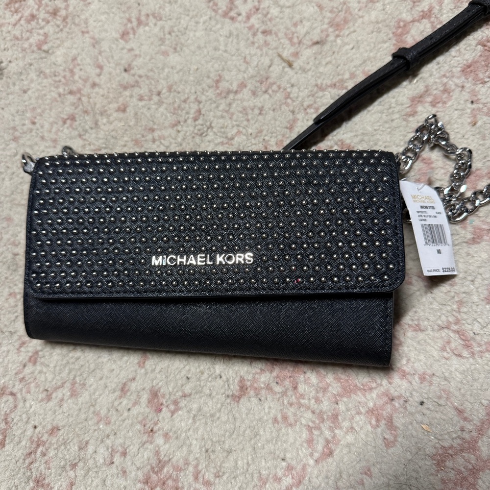 Michael Kors clutch — never used
